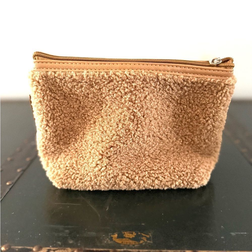 Neiman Marcus tan sherpa cosmetic bag